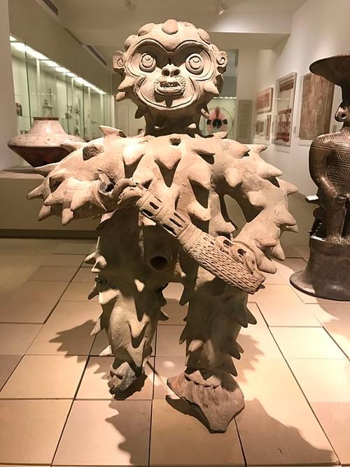La Tolita mythological figure in feathered costume, Ecuador